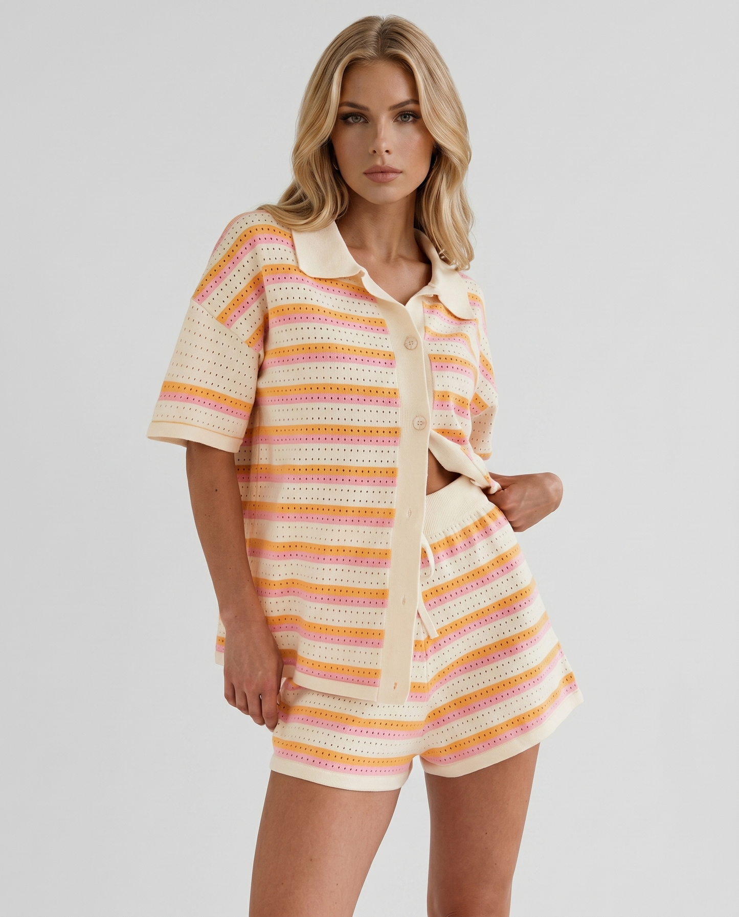 Women cream striped polo top and matching shorts set with button placket, front cropped view