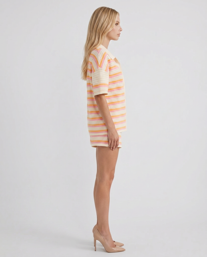 Women cream striped polo top and shorts set with relaxed silhouette, side profile
