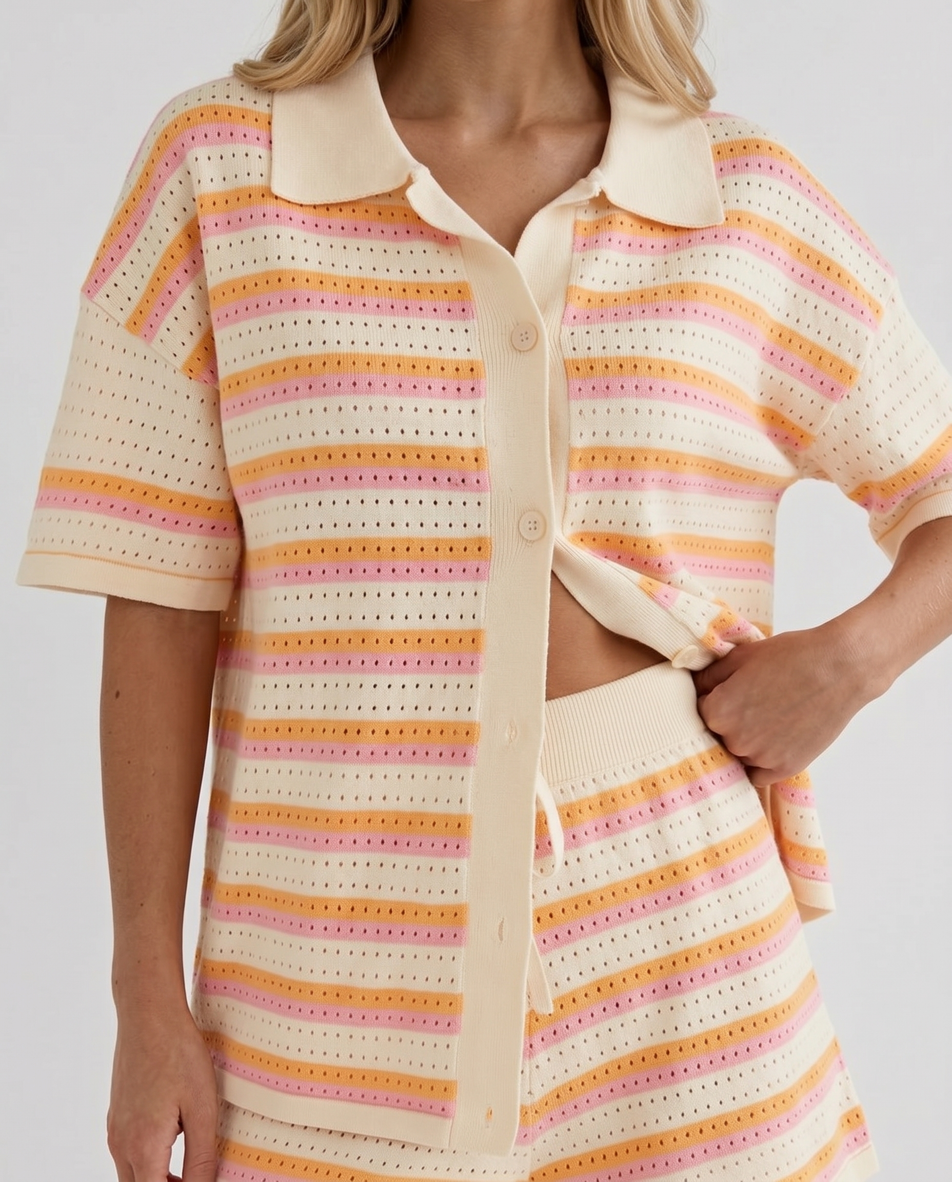 Women cream striped shorts set closeup of polo collar, button placket, and stripe pattern
