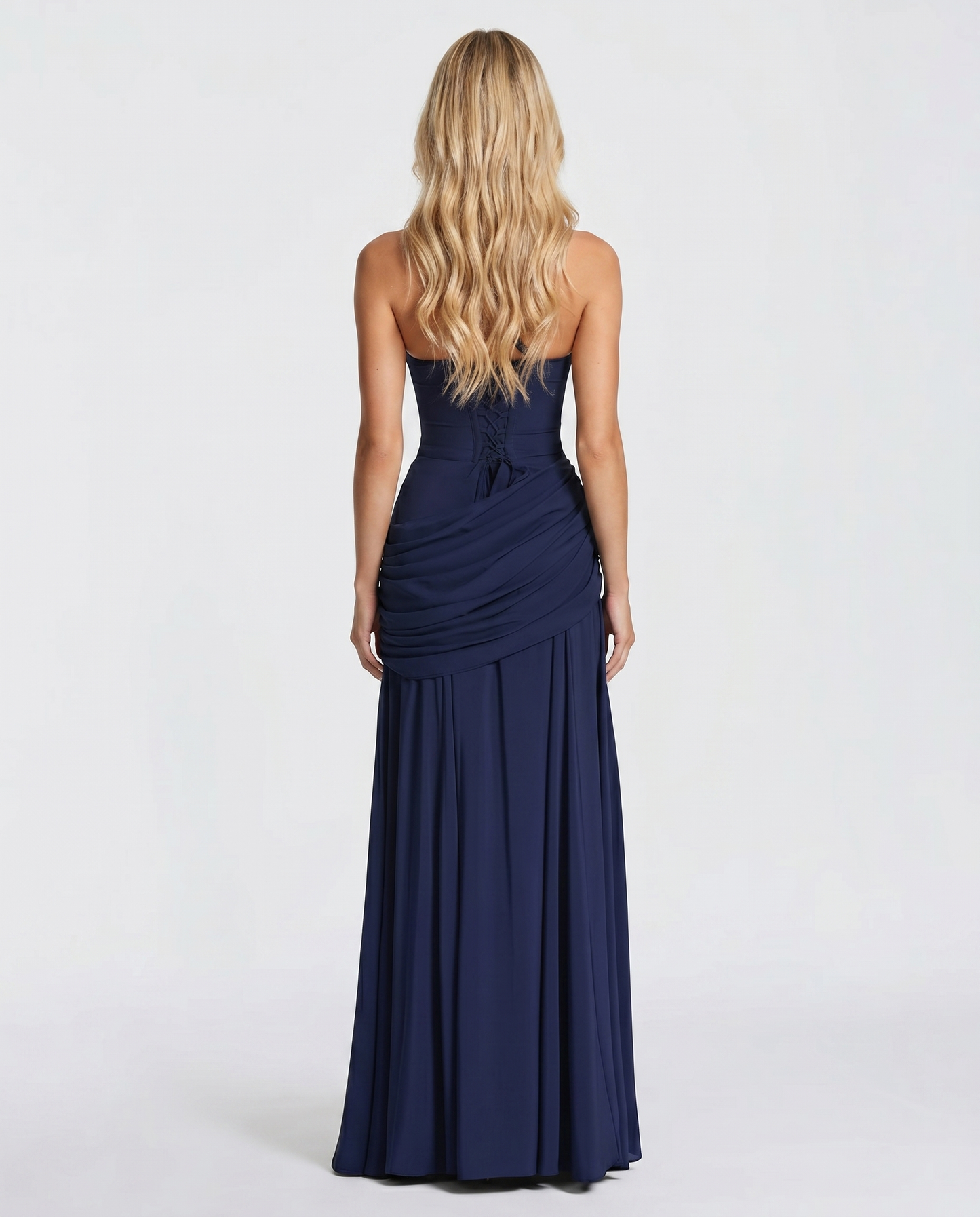 Women navy ruched maxi dress with fitted back bodice and flowing maxi skirt, back view
