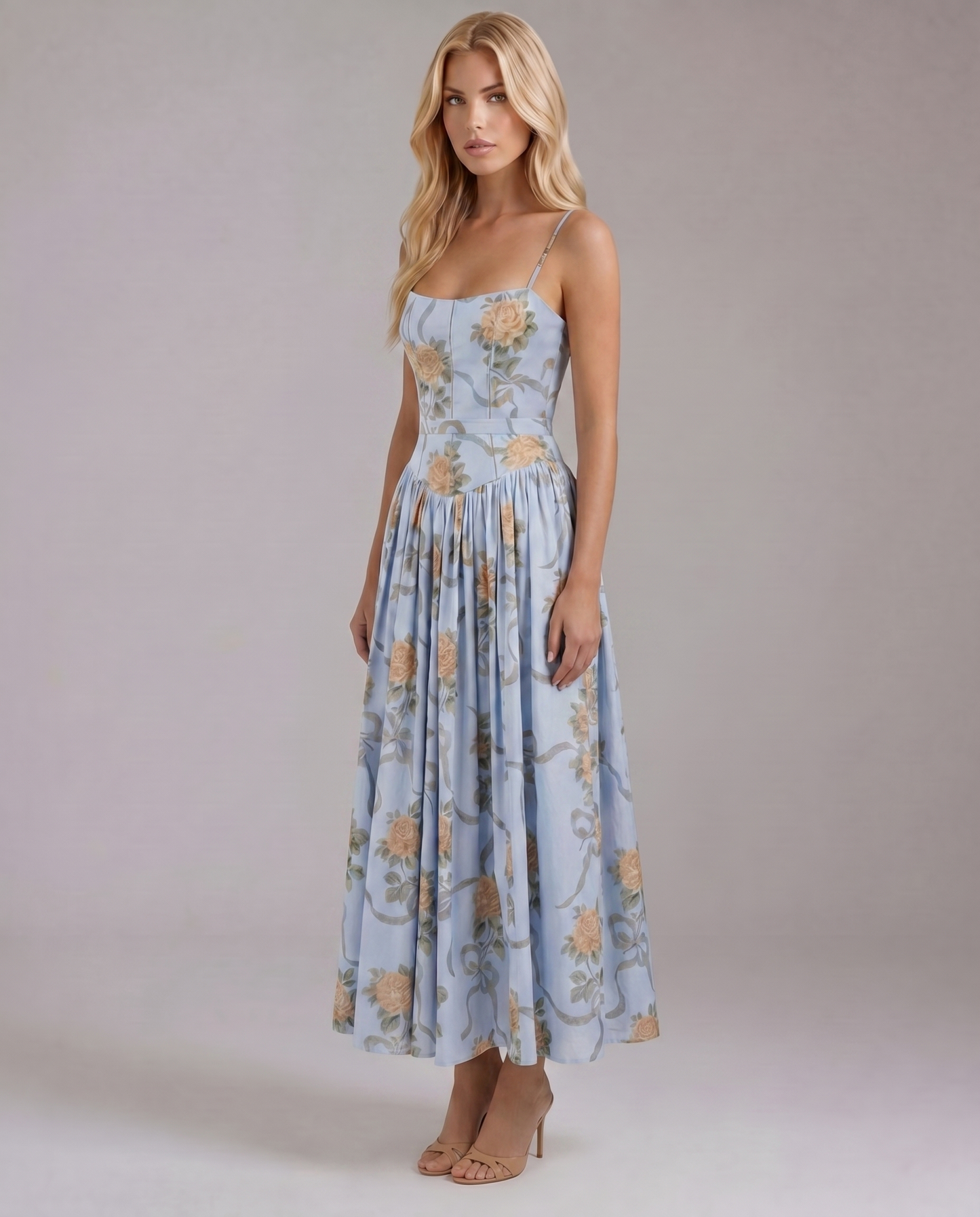 Three-quarter view of vintage blue floral midi dress showing corset-style bodice and flowy skirt