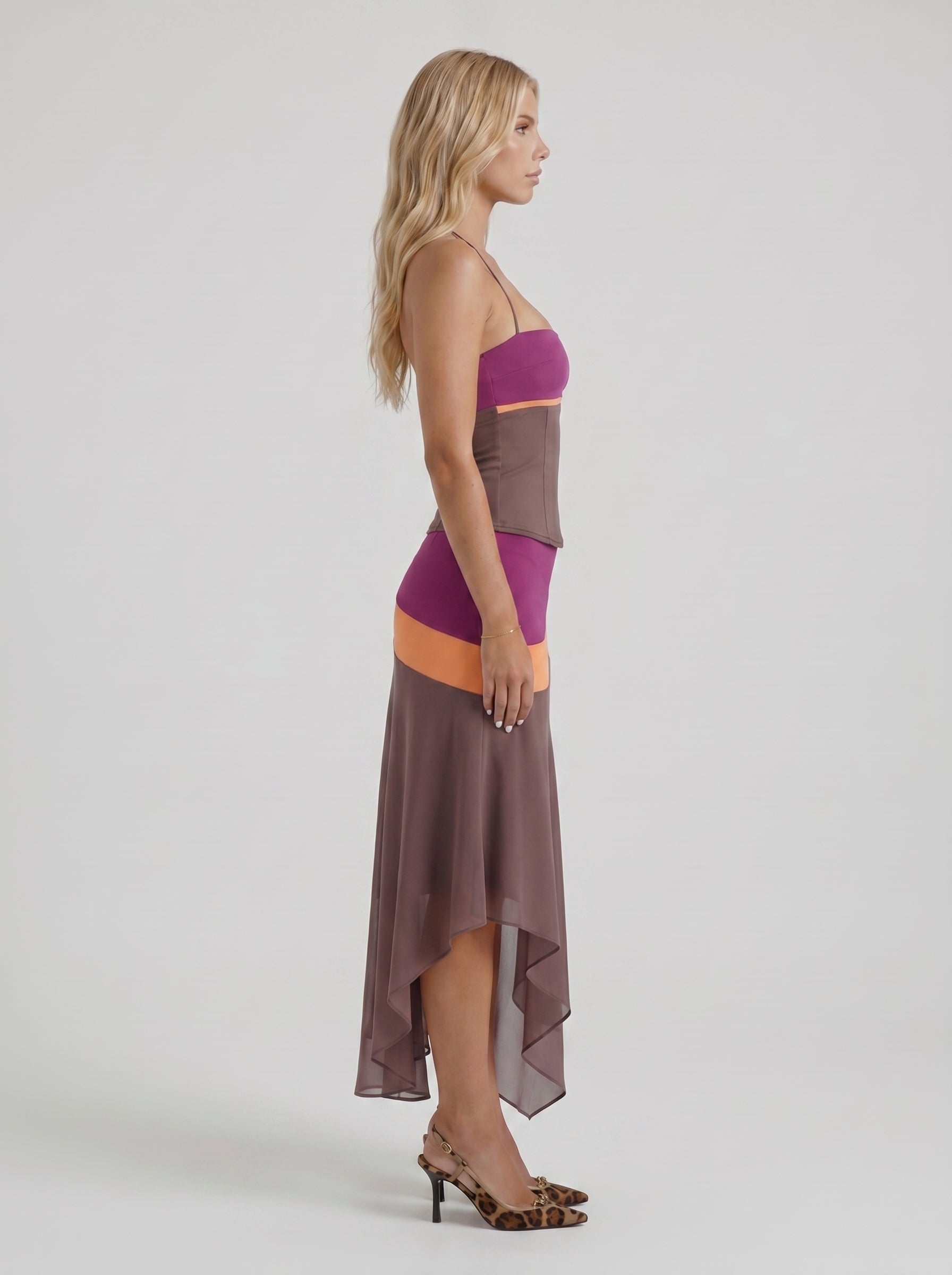 Women mauve and orange color block bandeau asymmetric skirt set, side profile view