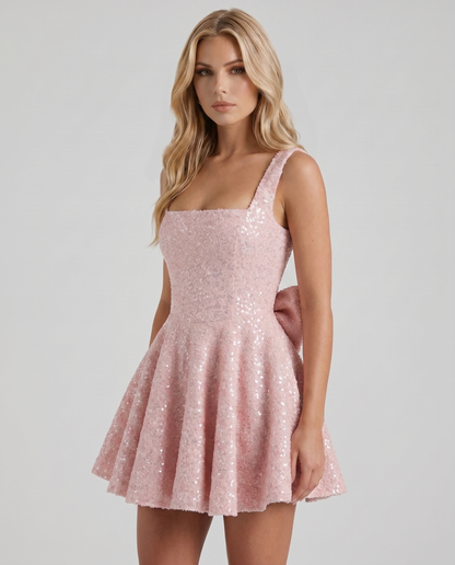 Women blush square neck bow back mini dress with fitted bodice and flared skirt, 45 degree angle