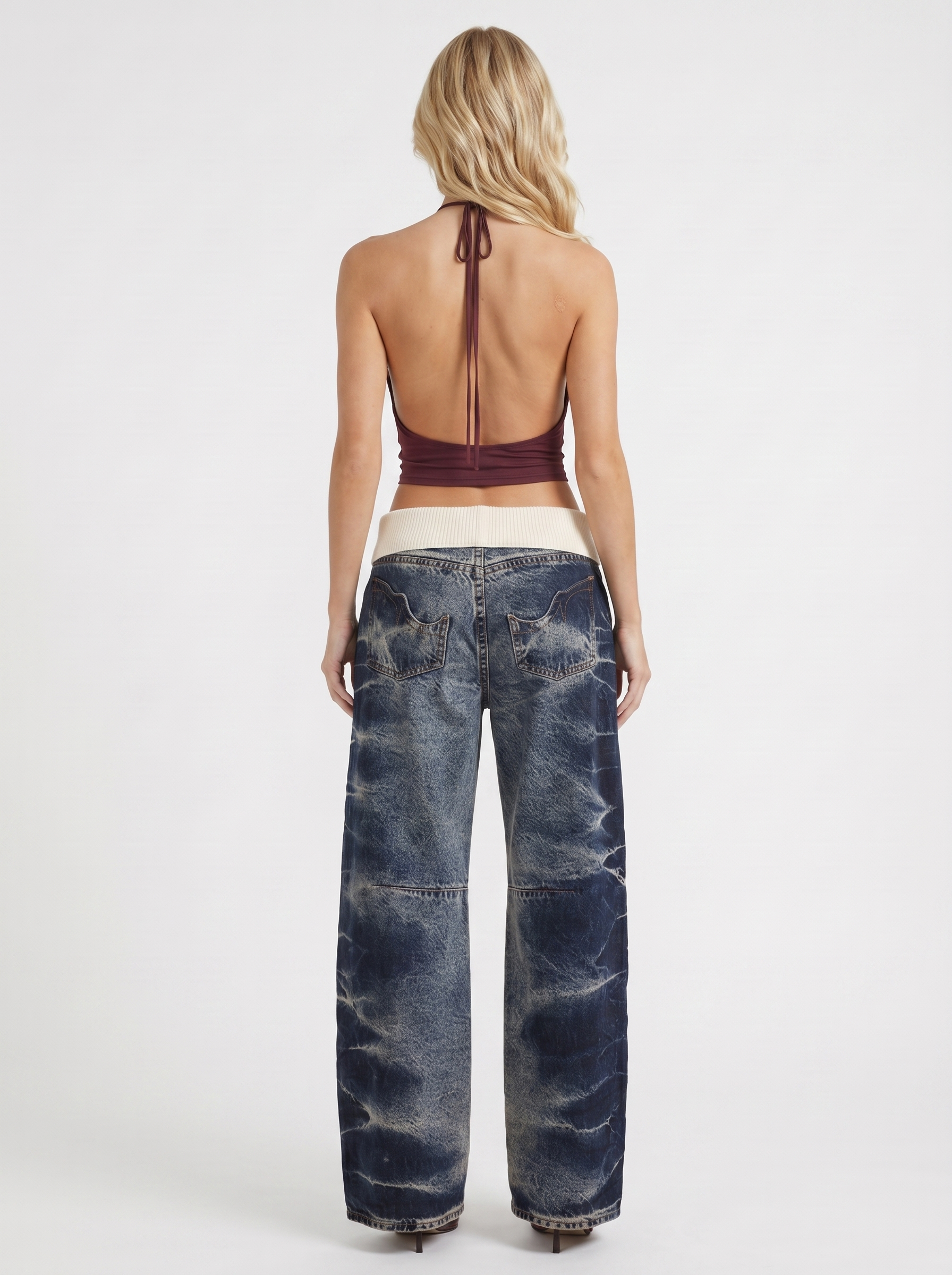 Women dark blue baggy wide leg distressed denim jeans, back view