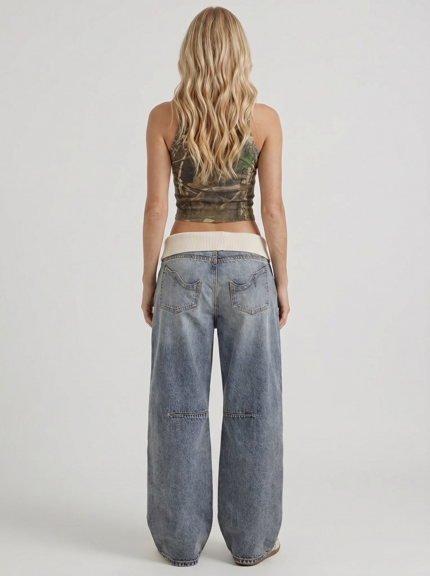 Women light blue baggy wide leg distressed denim jeans, back view