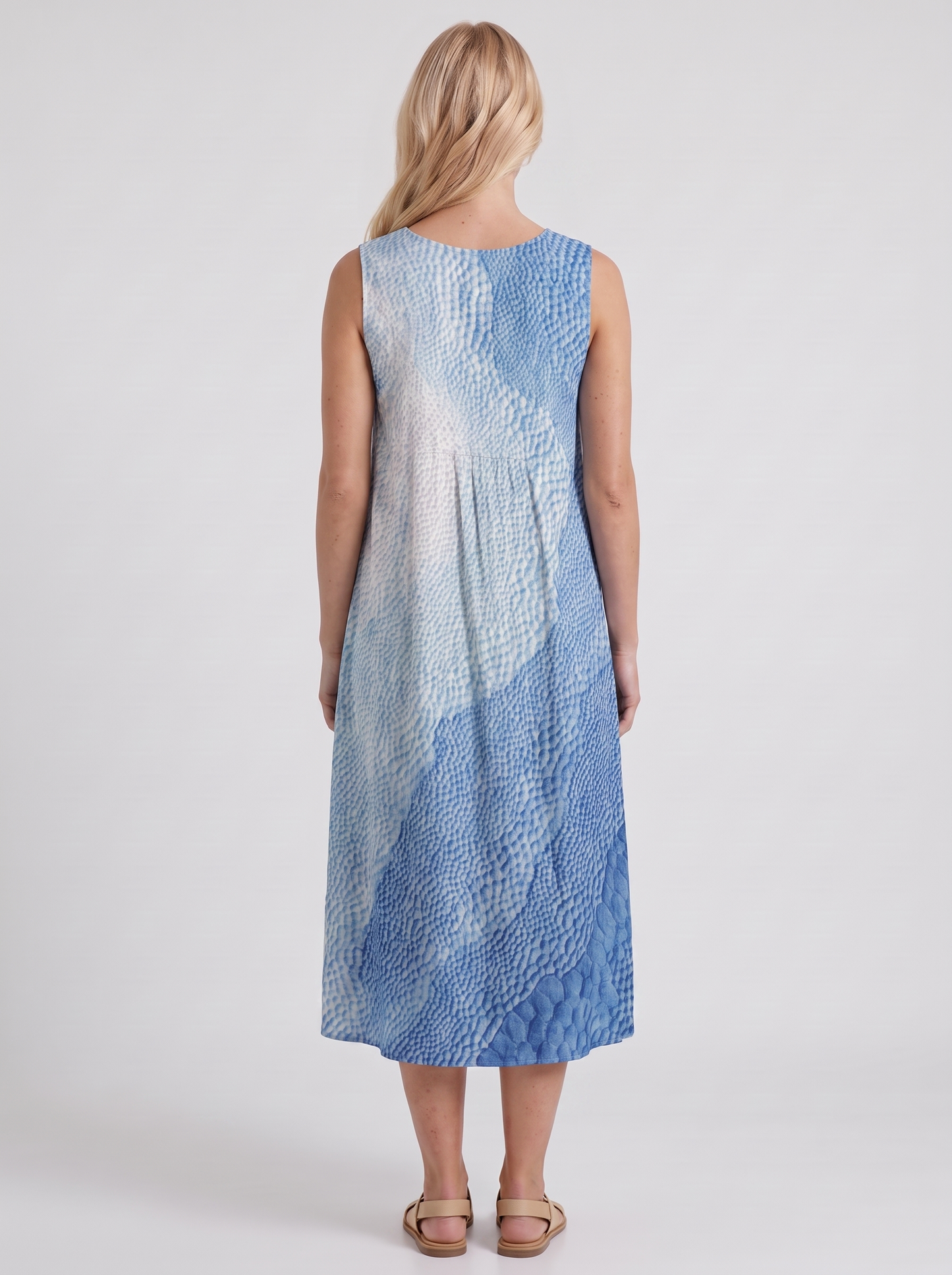 Women blue printed midi dress with round neckline and all over print