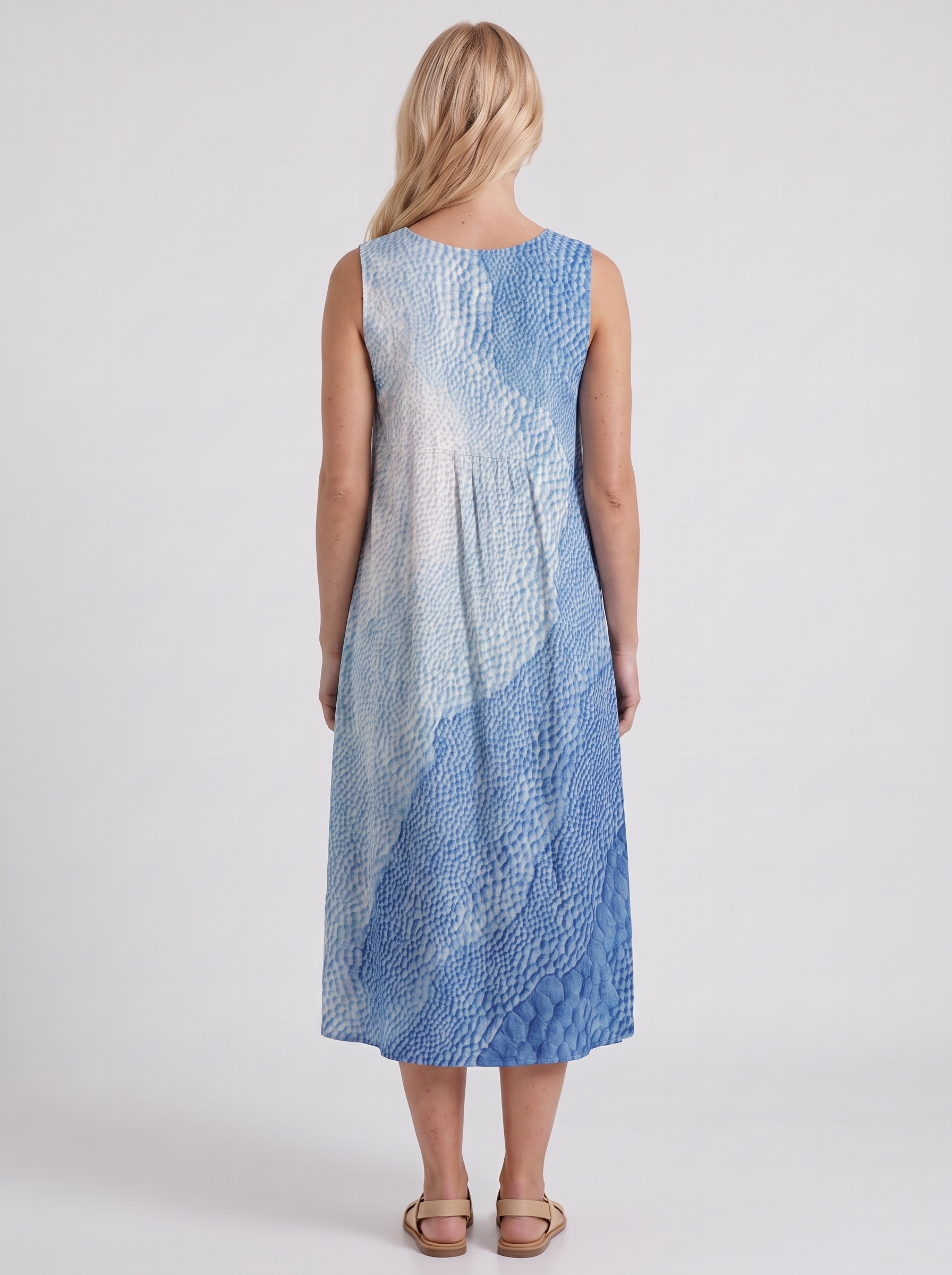 Women blue printed midi dress with round neckline and all over print