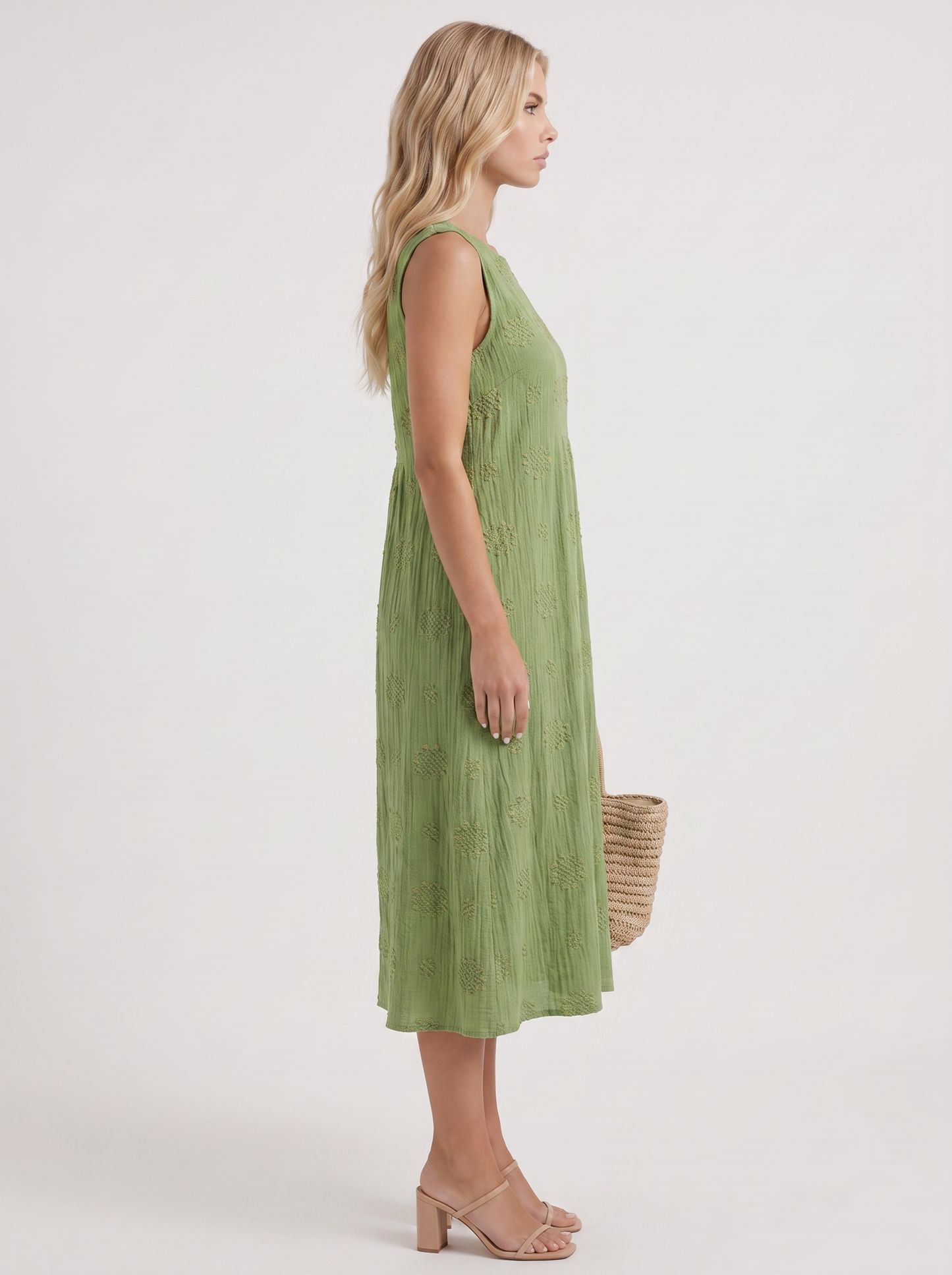 Women green embroidered midi dress with round neckline and embroidered detail