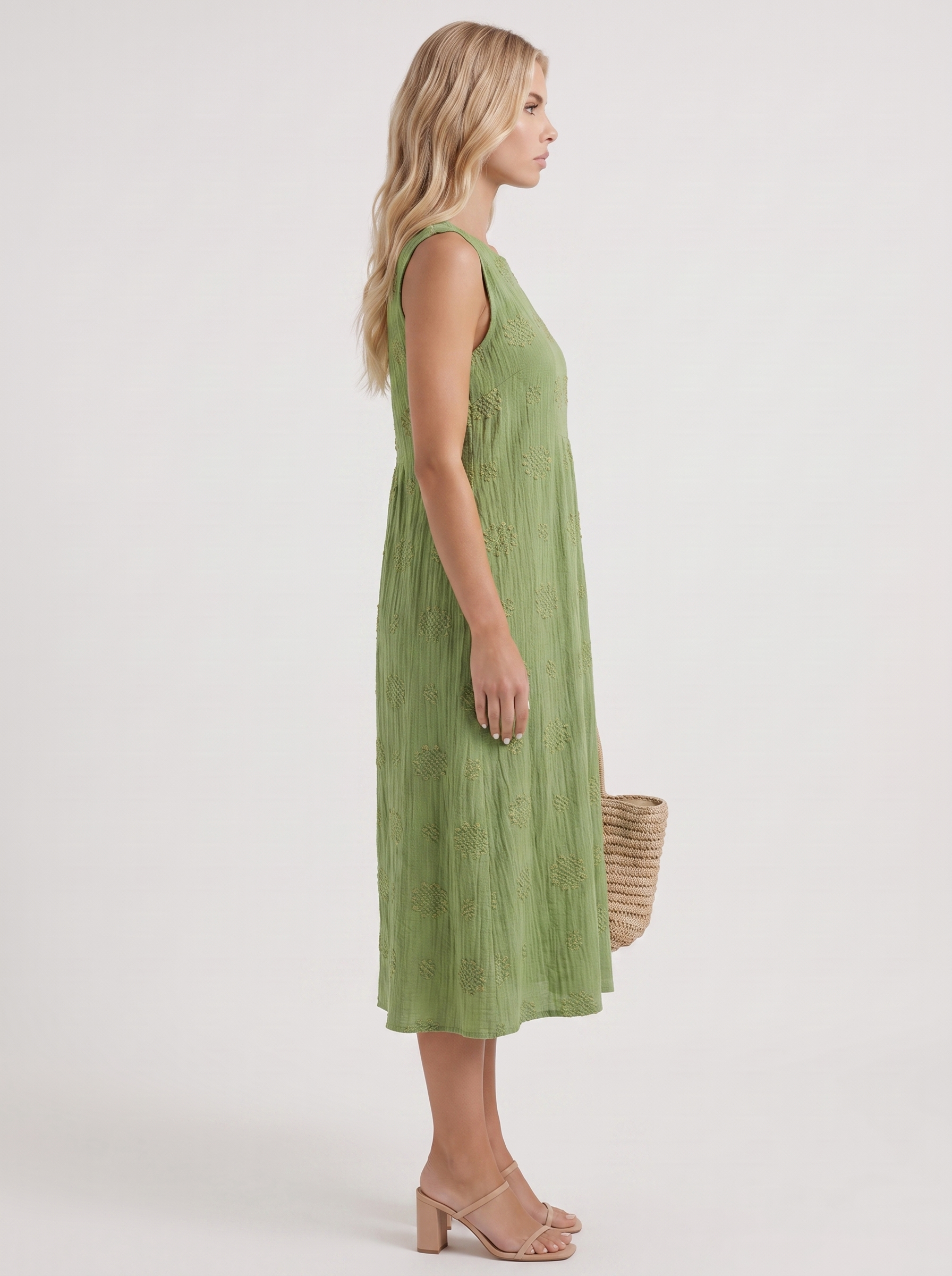 Women green embroidered midi dress with round neckline and embroidered detail