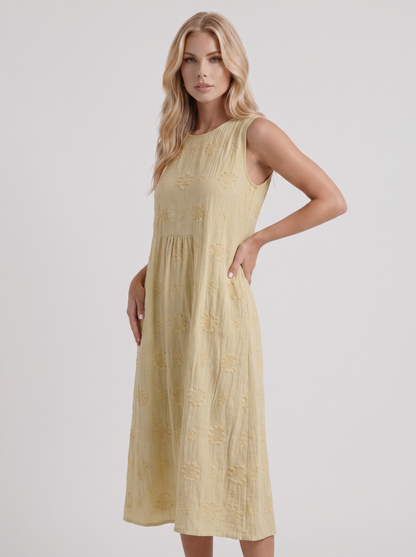 Women light yellow embroidered midi dress with round neckline and embroidered detail