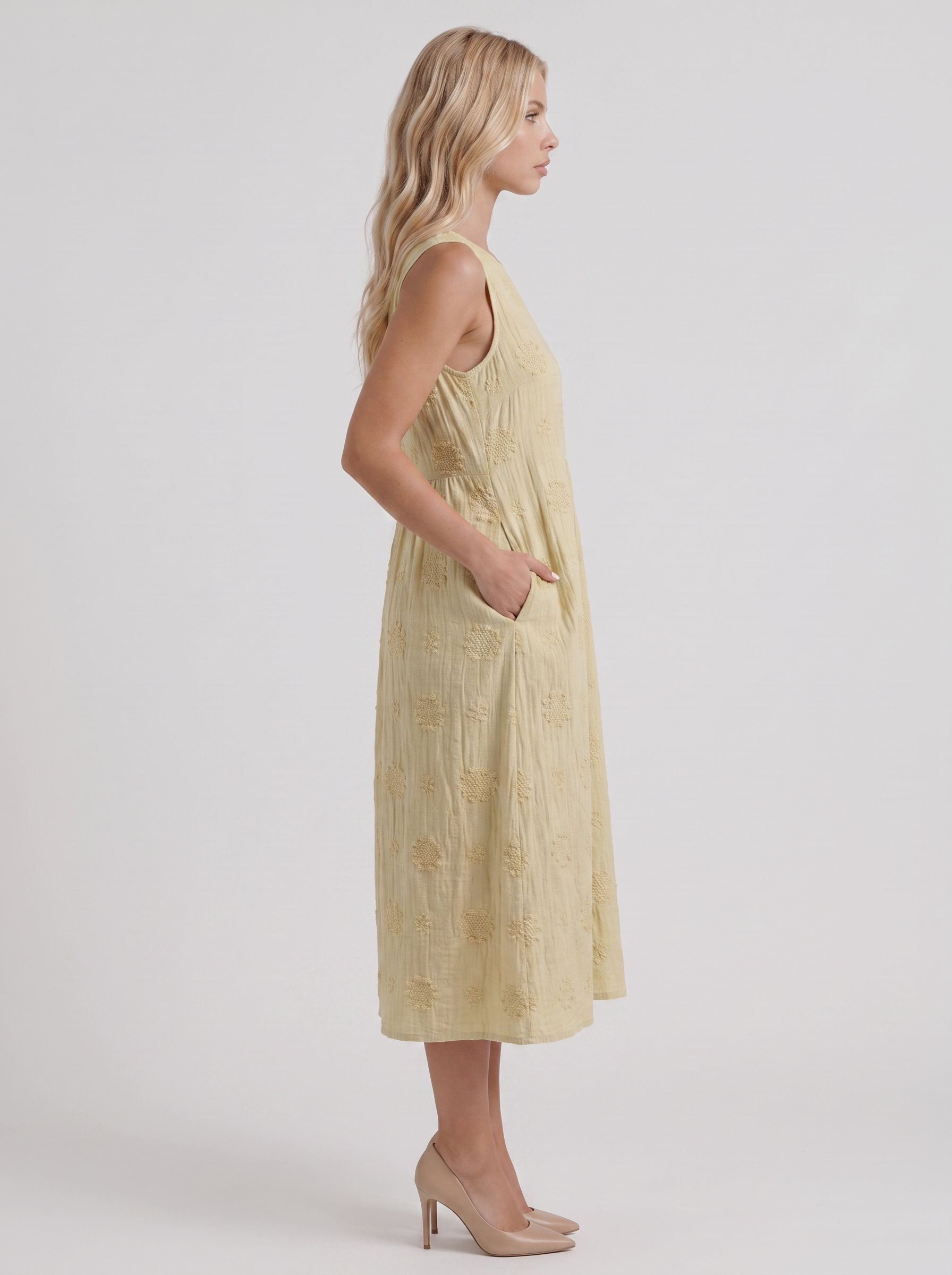 Women light yellow embroidered midi dress with round neckline and embroidered detail