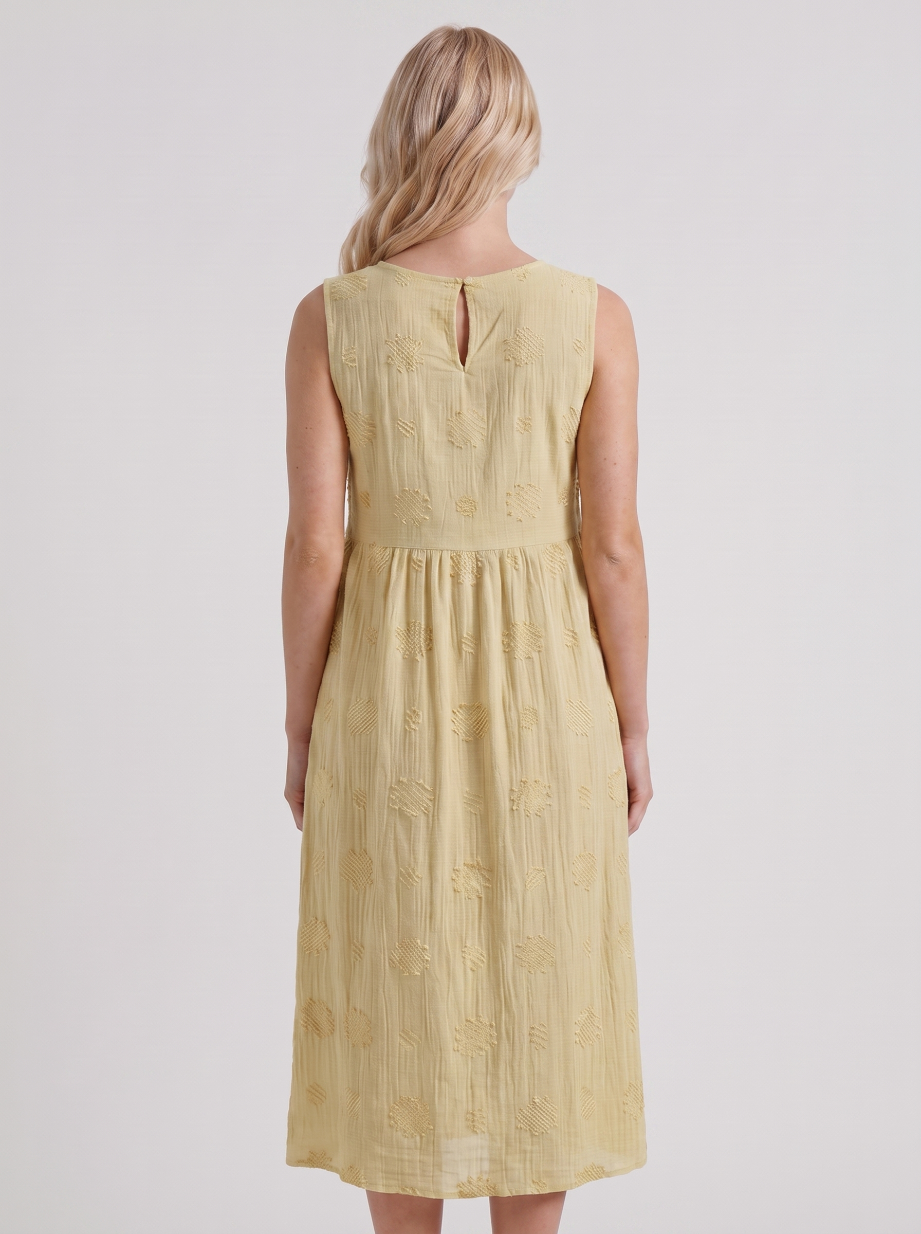 Women light yellow embroidered midi dress with round neckline and embroidered detail