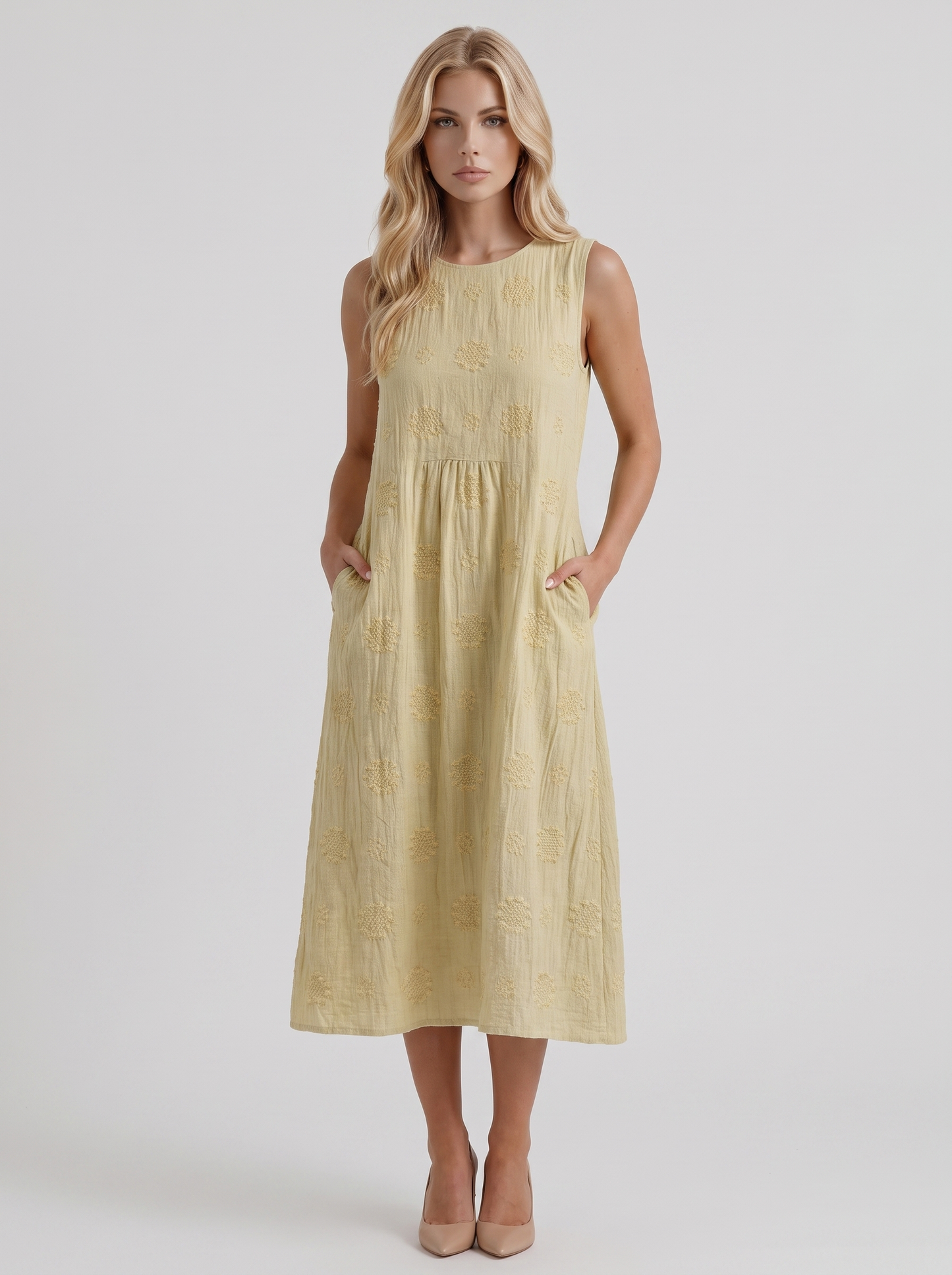 Women light yellow embroidered midi dress with round neckline and embroidered detail