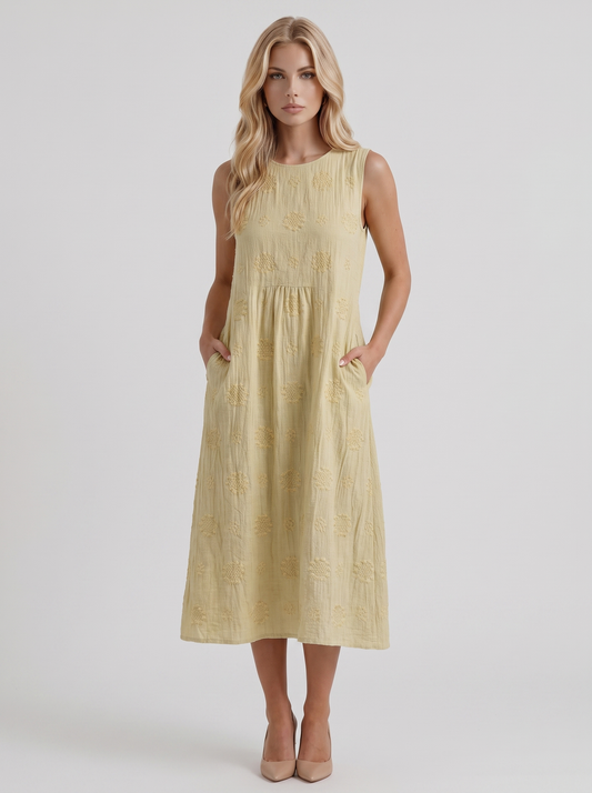 Women light yellow embroidered midi dress with round neckline and embroidered detail