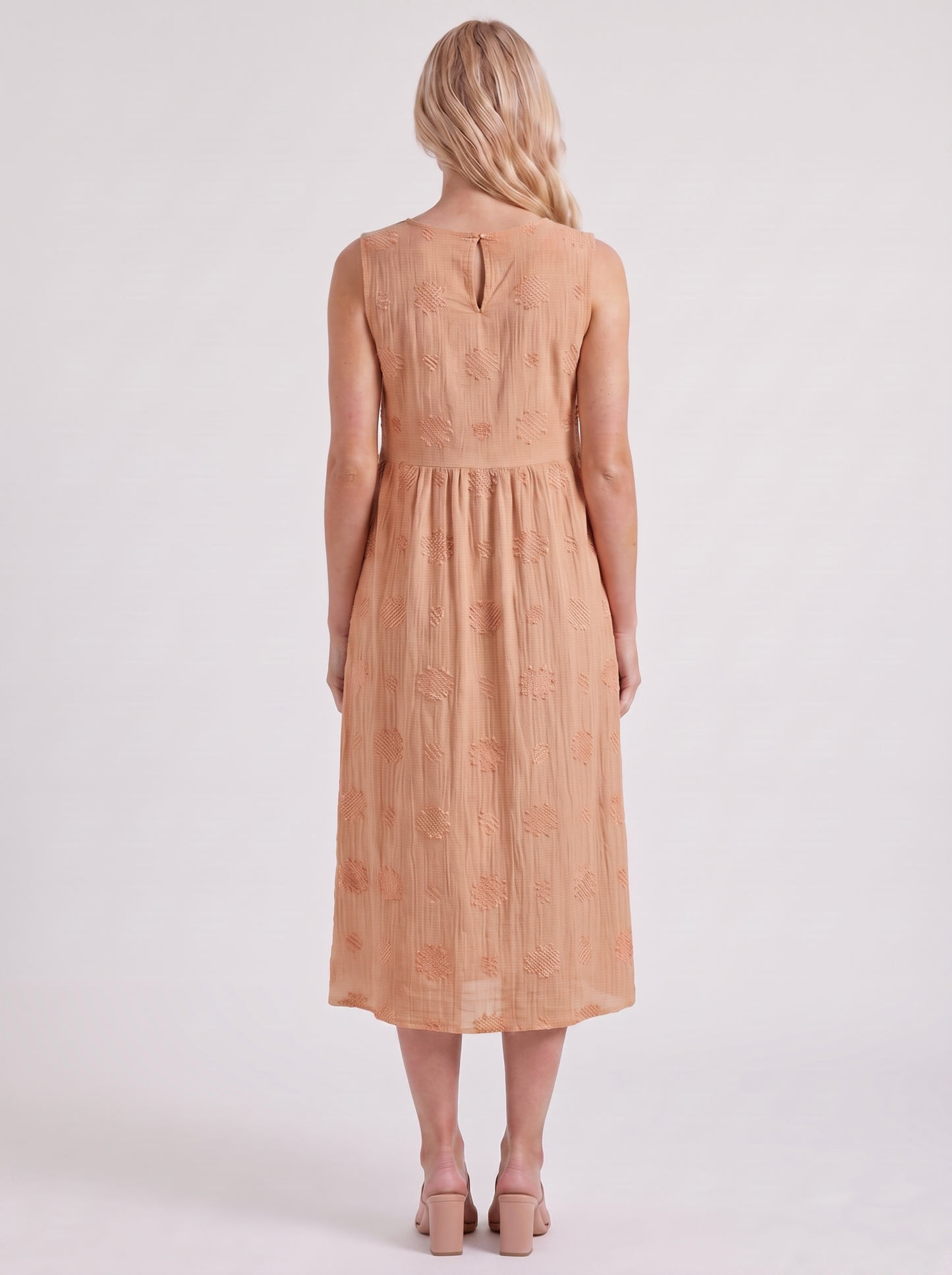 Women orange embroidered midi dress with round neckline and embroidered detail