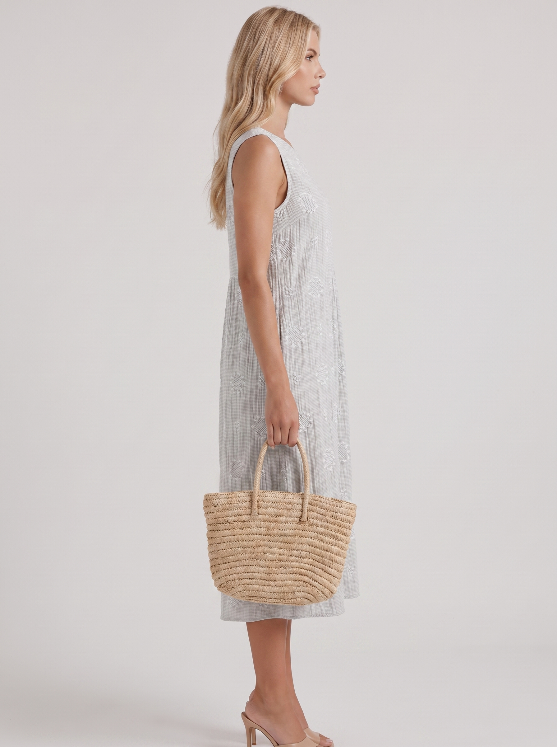 Women white embroidered midi dress with round neckline and embroidered detail