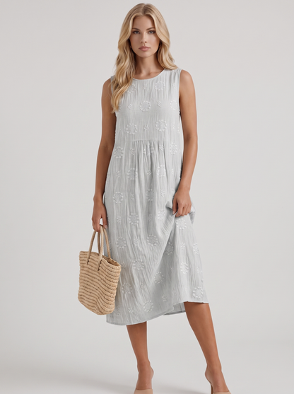 Women white embroidered midi dress with round neckline and embroidered detail