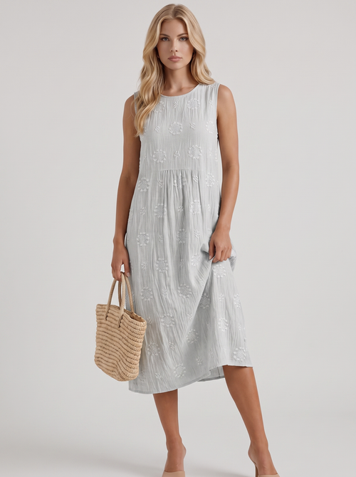 Women white embroidered midi dress with round neckline and embroidered detail
