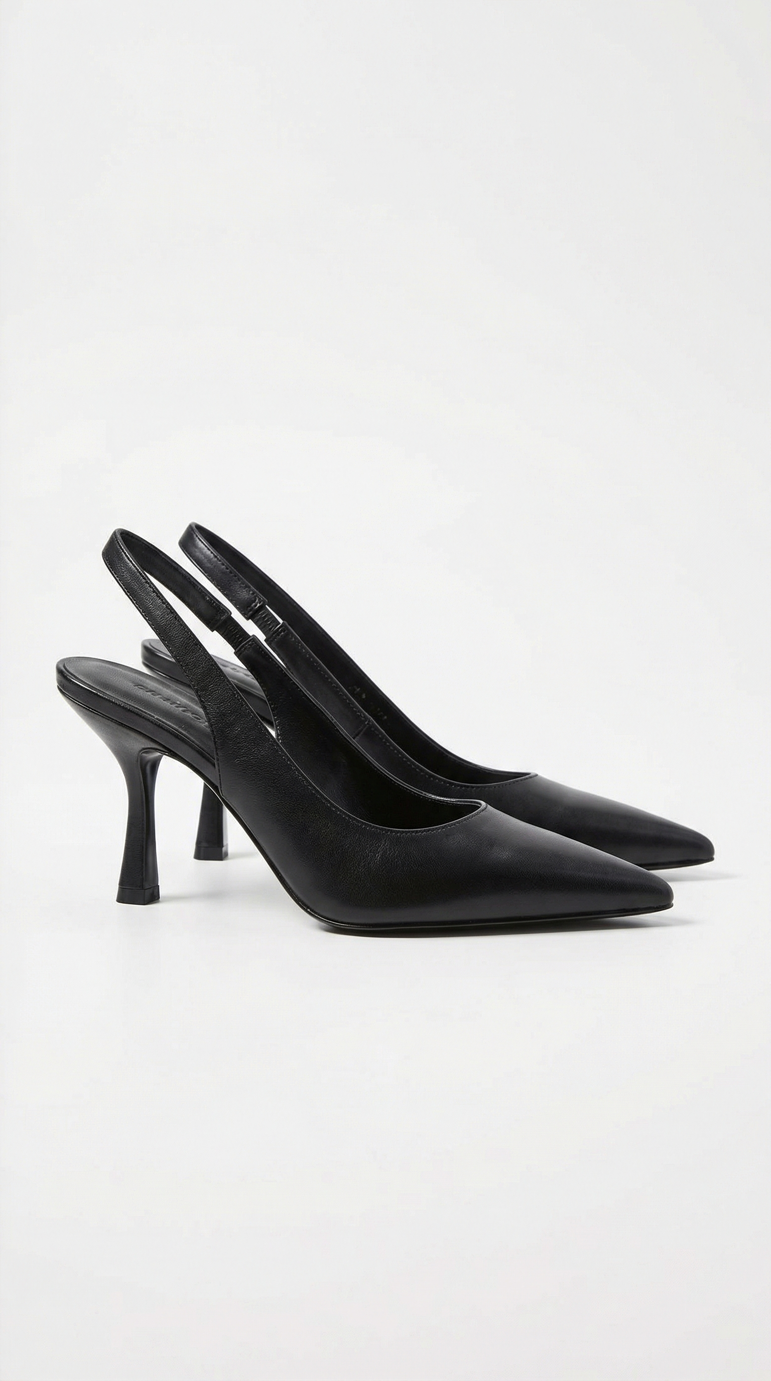 Women black heeled sandals with pointed toe and slingback strap