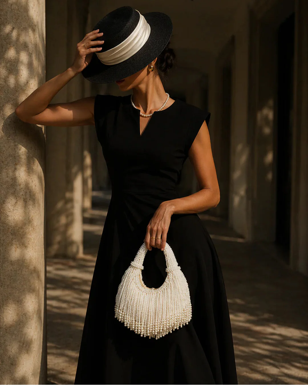 Women white shoulder bag with pearl beading and beaded detail
