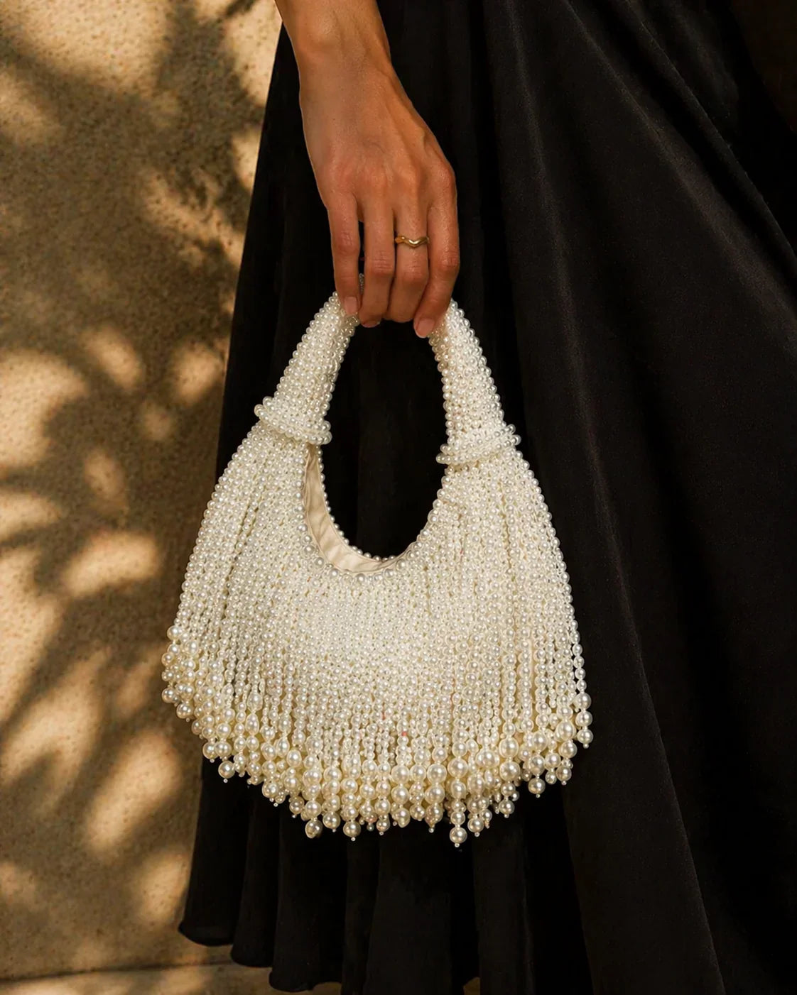 Women white shoulder bag with pearl beading and beaded detail