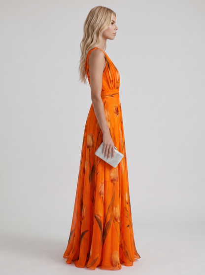 Women orange floral maxi dress with v neckline and tulip floral print