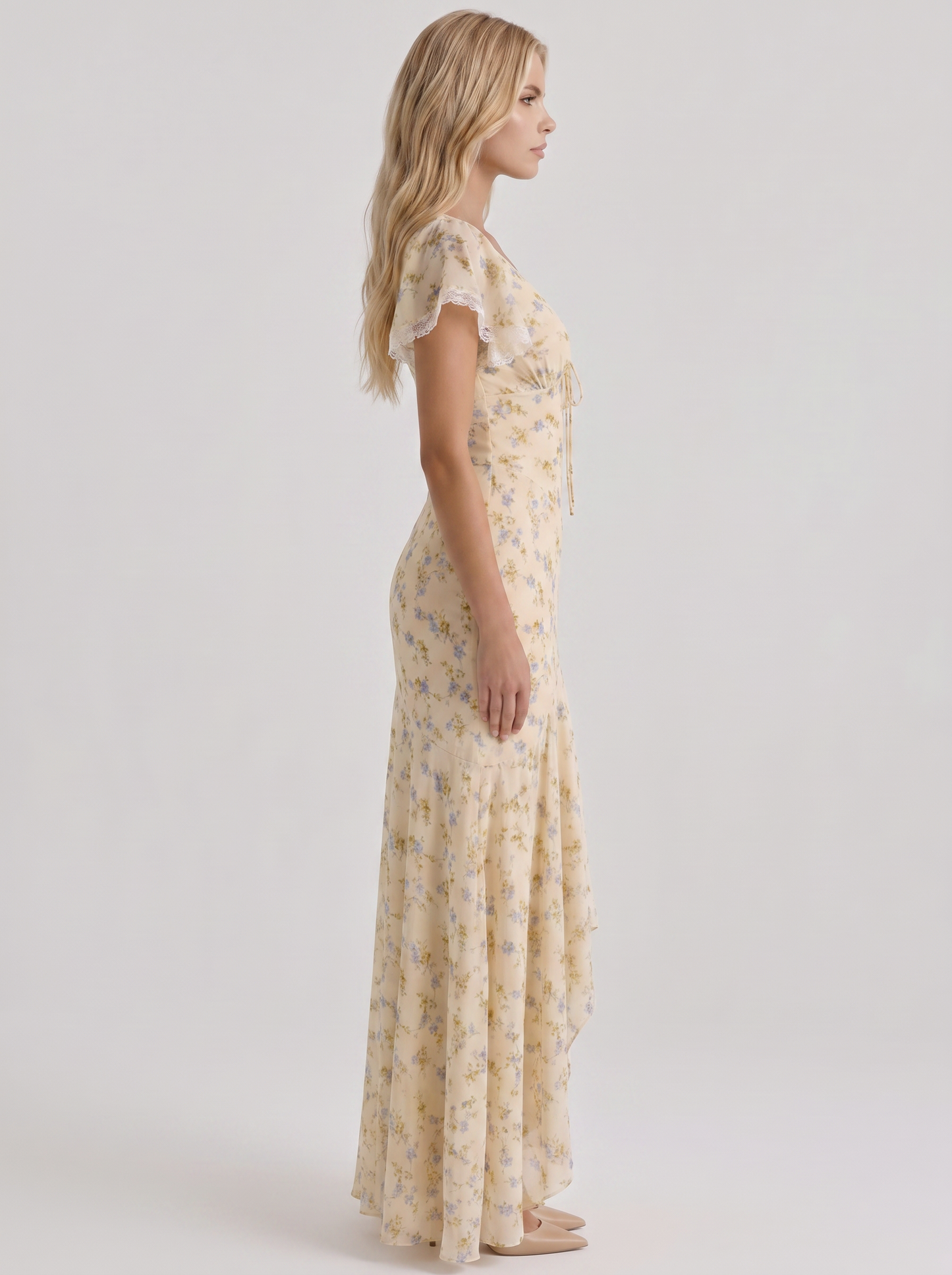 Women cream floral V neck flutter sleeve fishtail maxi gown, side profile view