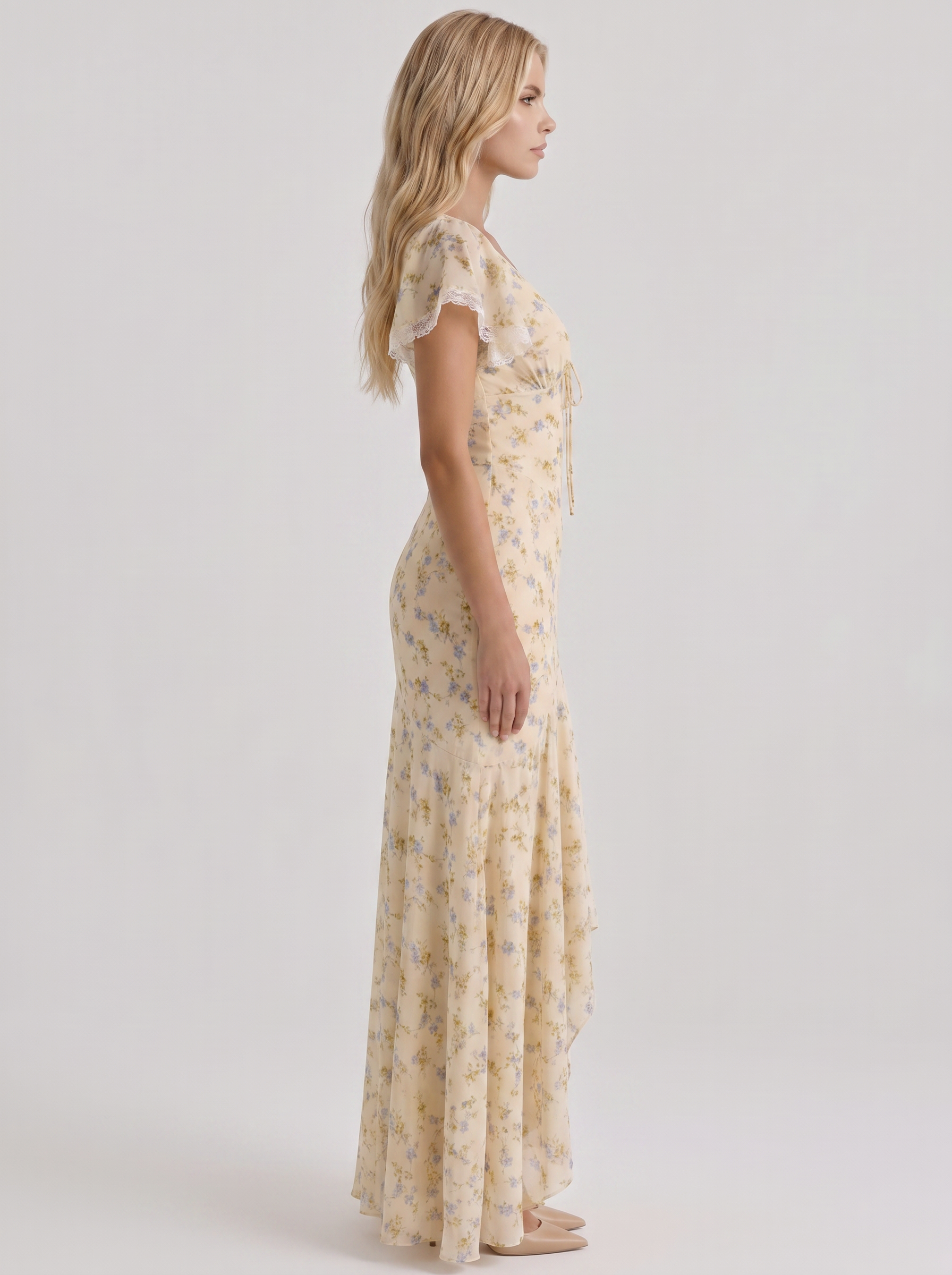 Women cream floral V neck flutter sleeve fishtail maxi gown, side profile view