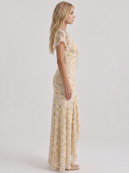 Women cream floral V neck flutter sleeve fishtail maxi gown, side profile view