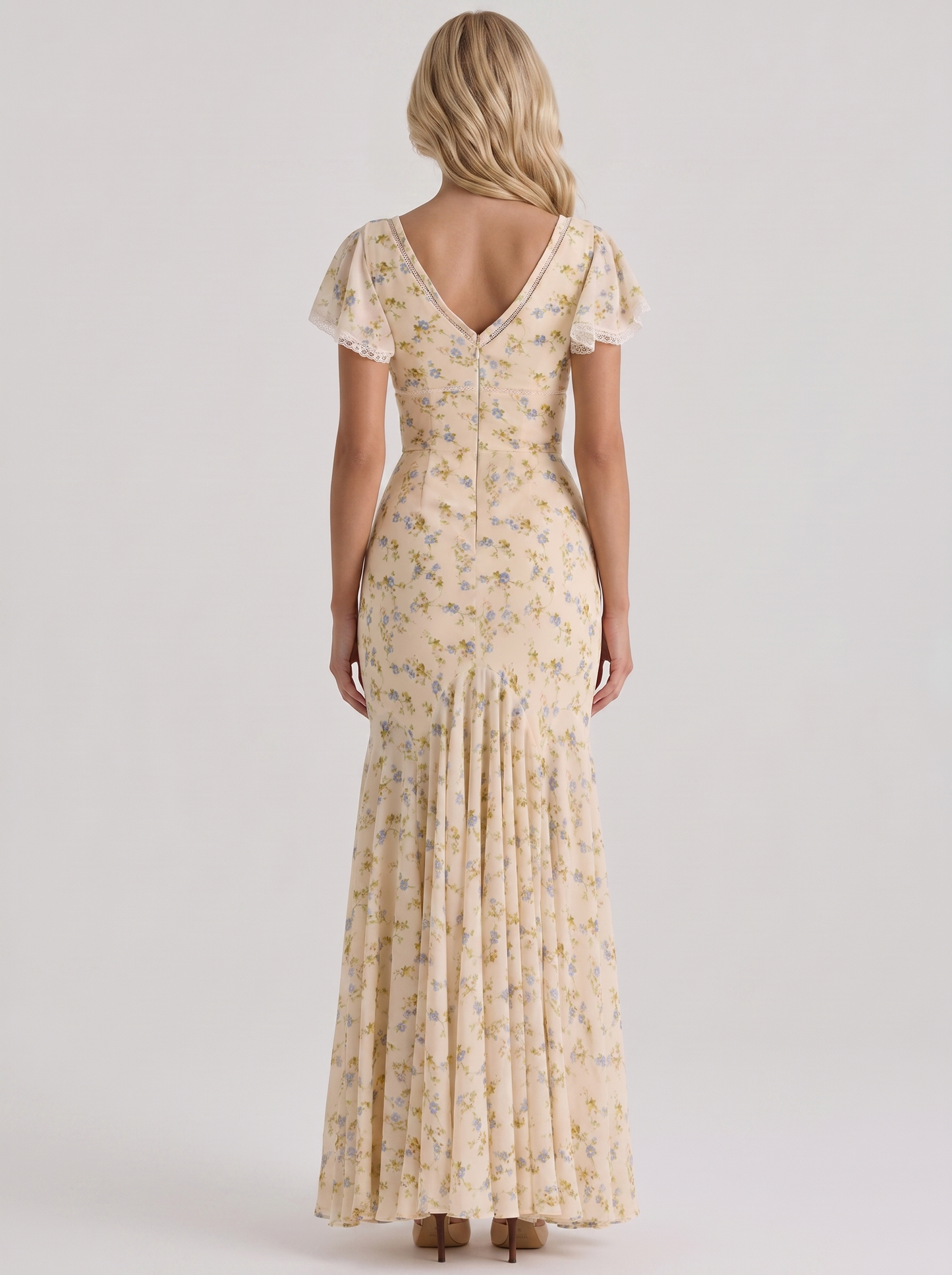 Women cream floral V neck flutter sleeve fishtail maxi gown, back view