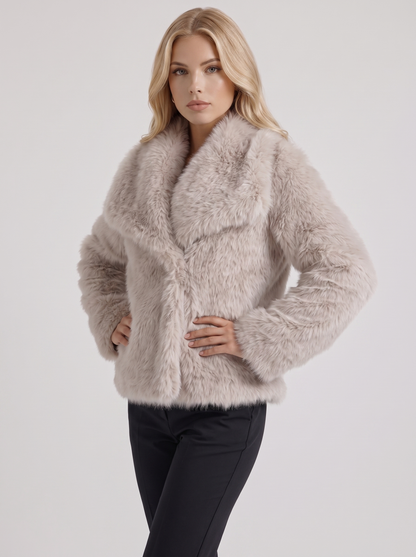 Women's beige fur coat with plush fur texture and hip length hem