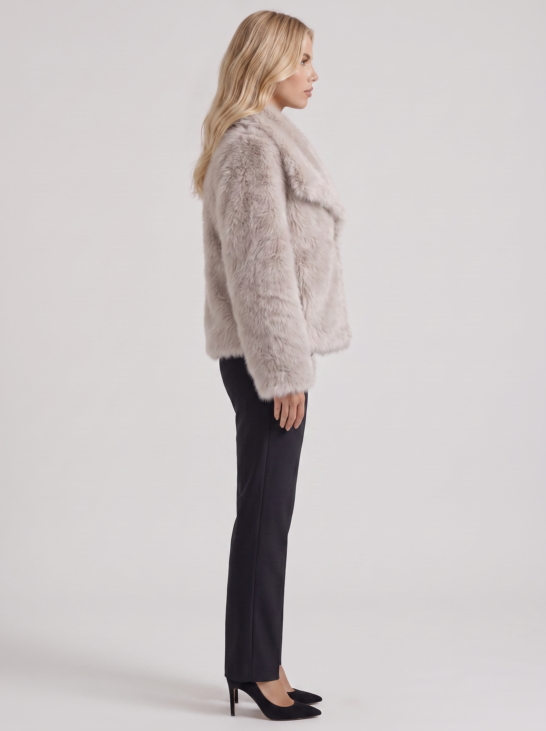 Women's beige fur coat with plush fur texture and hip length hem