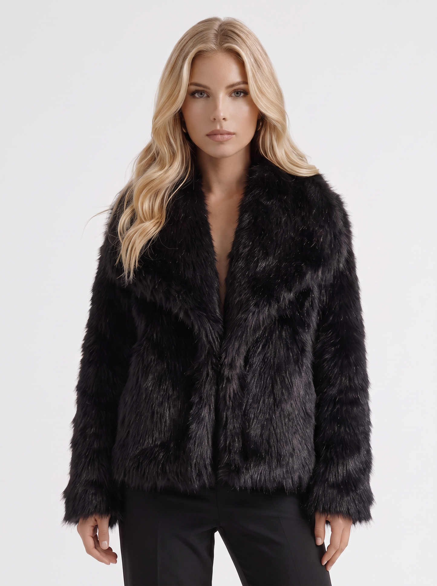 Women's black fur coat with plush fur texture and hip length hem