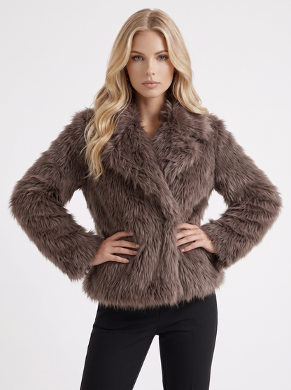 Women's brown fur coat with plush fur texture and hip length hem