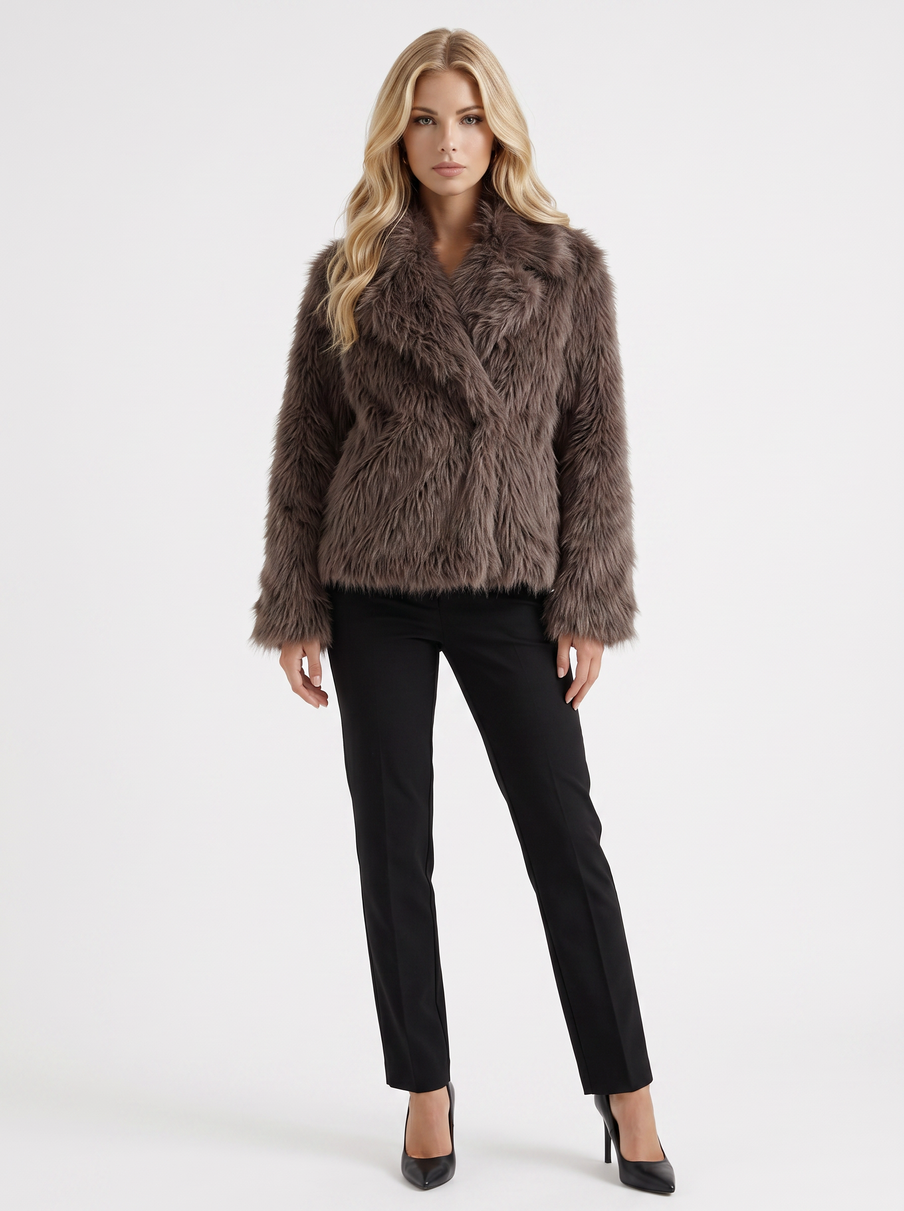 Women's brown fur coat with plush fur texture and hip length hem