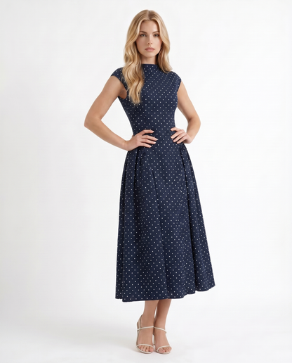 Women navy polka dot midi dress with crew neck and fit and flare skirt, 45 degree angle