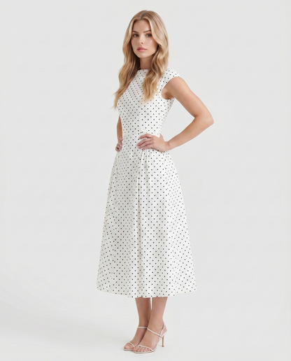 Women white polka dot midi dress with crew neck and fit and flare skirt, 45 degree angle