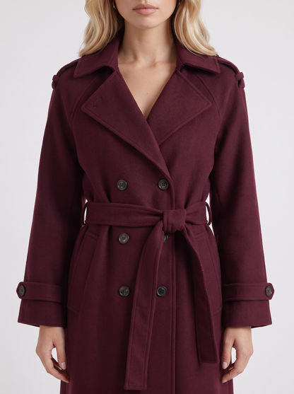 Women's burgundy trench coat with notch lapel and turn back cuffs