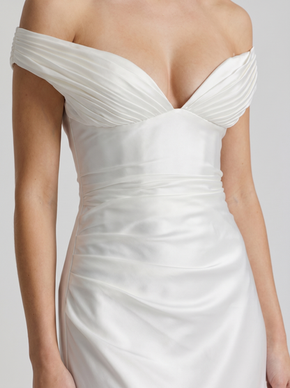 Women ivory satin off shoulder maxi dress closeup of draped shoulders and satin sheen