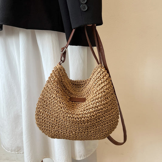 Women brown shoulder bag with adjustable strap and woven body
