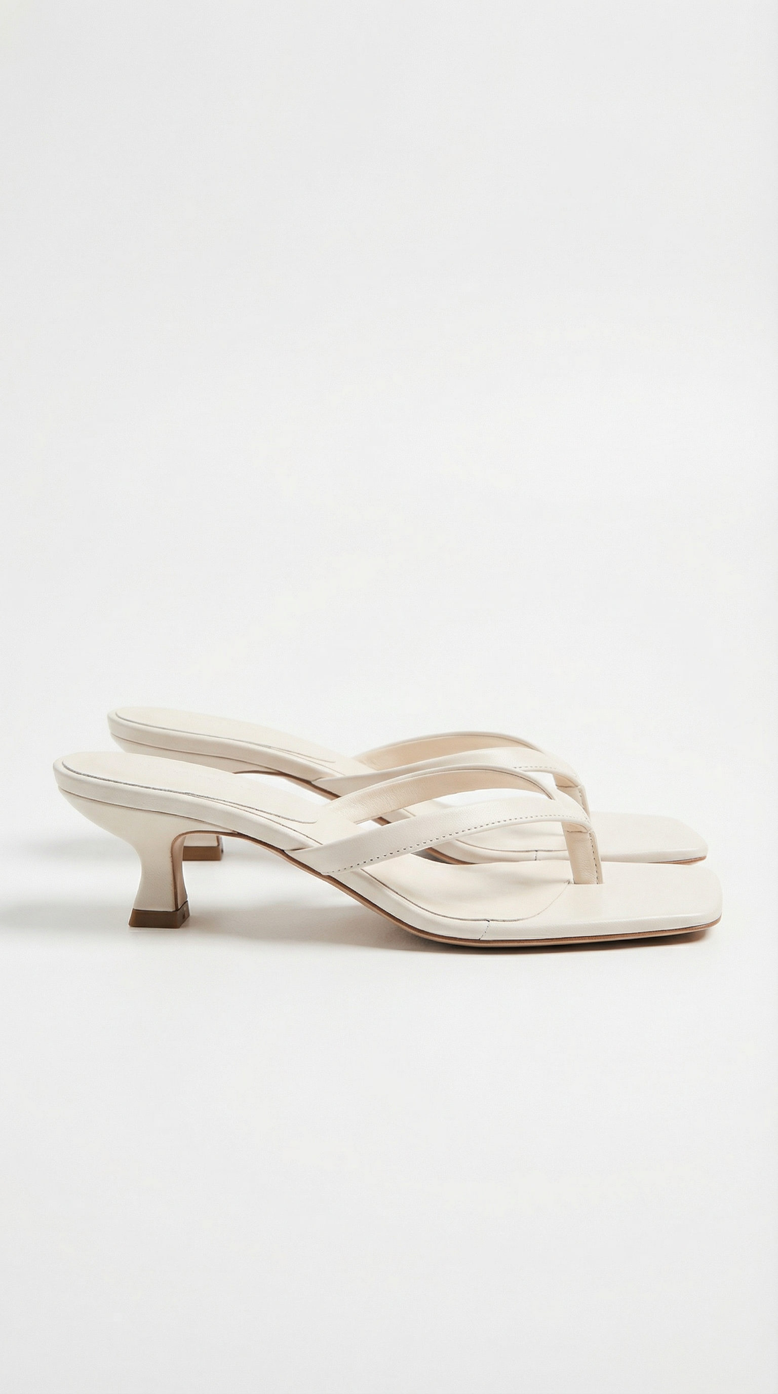Women beige heeled sandals with kitten heel and strappy design