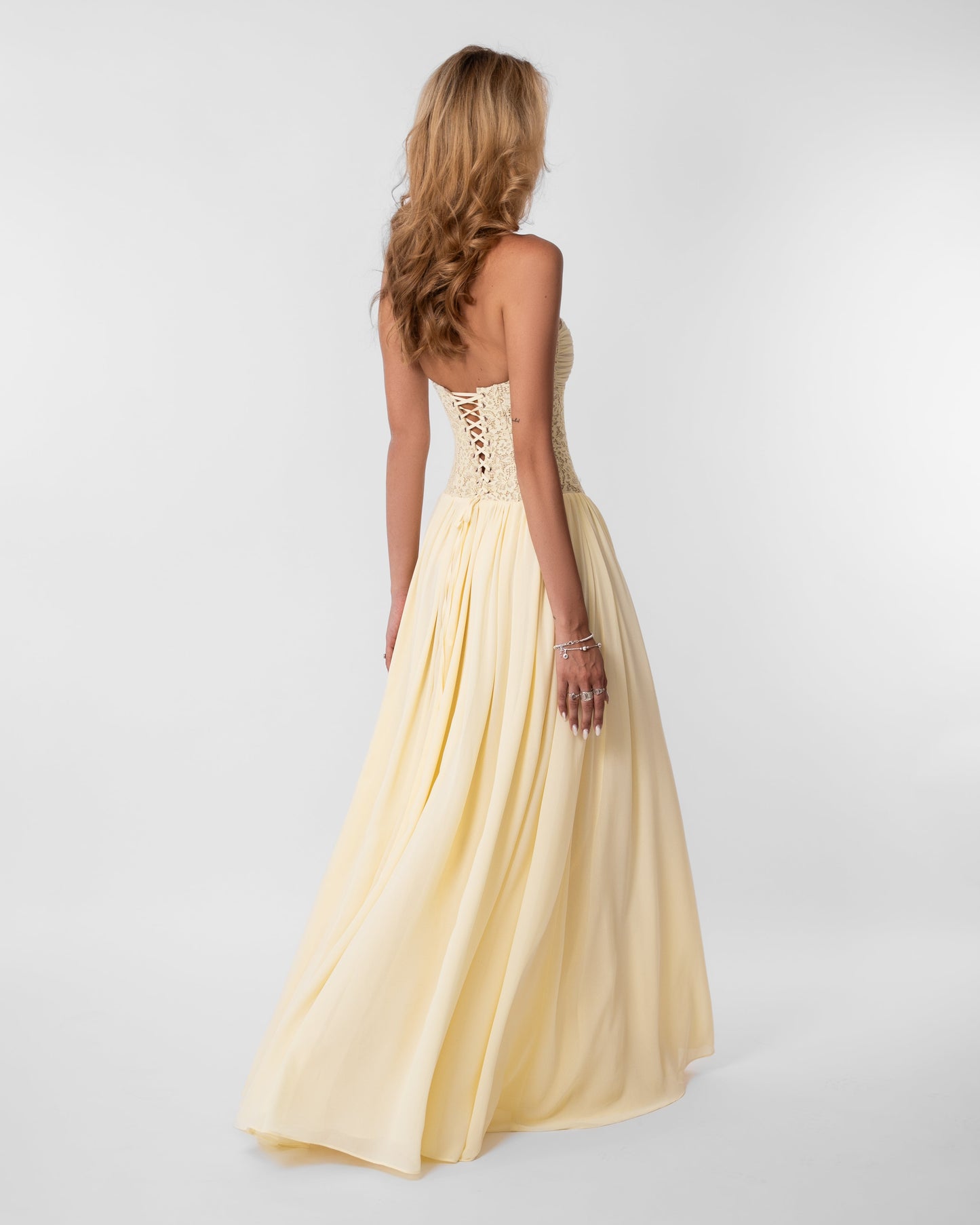 Women butter yellow lace corset maxi dress with sweetheart neckline and lace up back