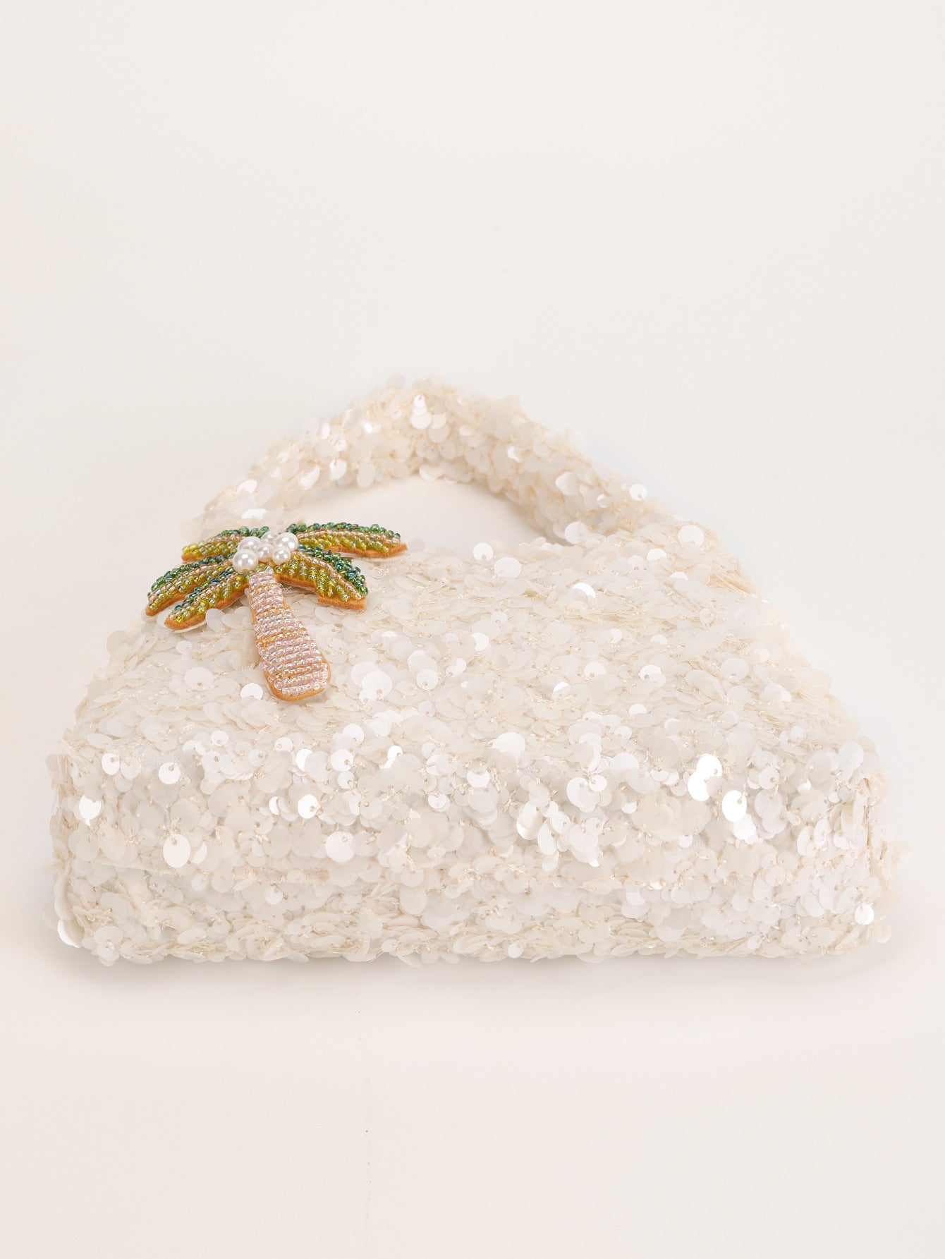 Women white shoulder bag with palm charm and sequin finish