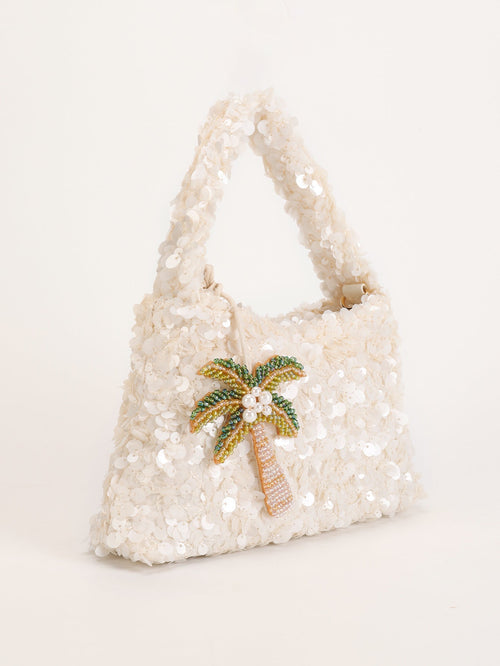 Women white shoulder bag with palm charm and sequin finish