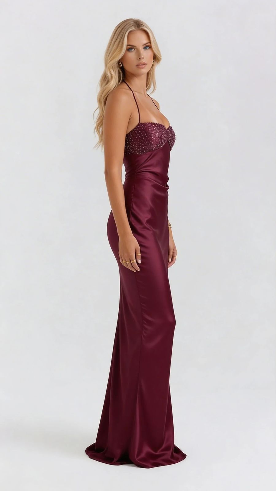 Women burgundy sequin maxi dress side view, showing satin fabric and long length