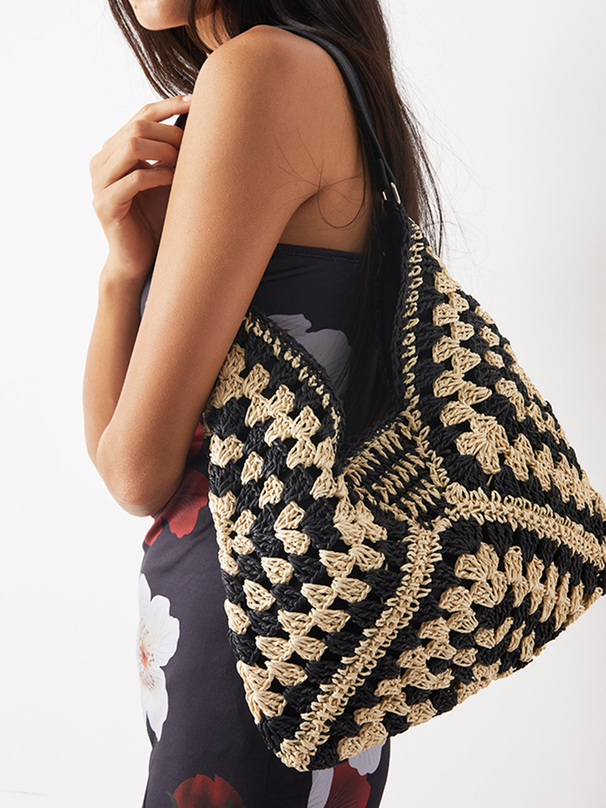 Women black shoulder bag with crochet knit and embroidered detail