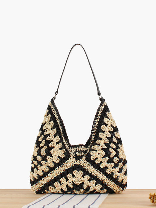 Women black shoulder bag with crochet knit and embroidered detail