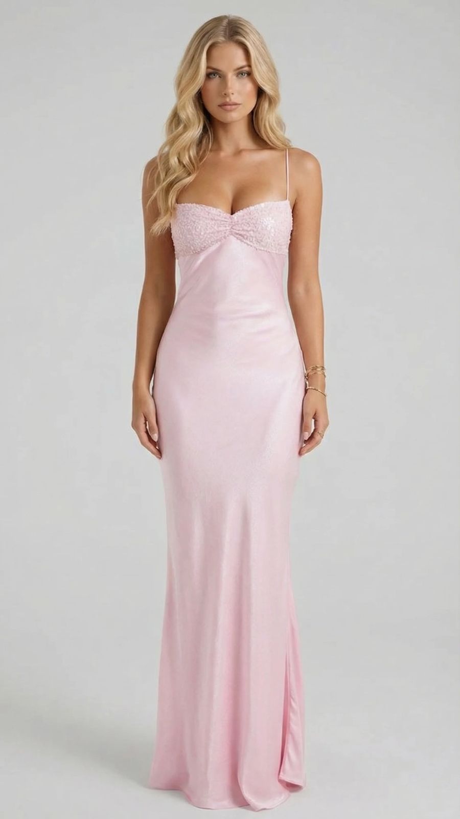 Women's pink sequin maxi dress, front view, with a sweetheart neckline and thin spaghetti straps