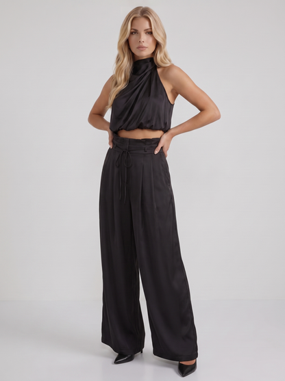 Women black pants set with halter crop top and draped satin front