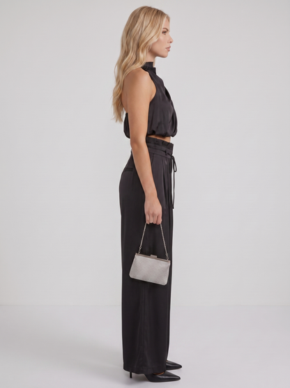 Women black pants set with halter crop top and draped satin front